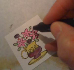 Stamped line image being colored in